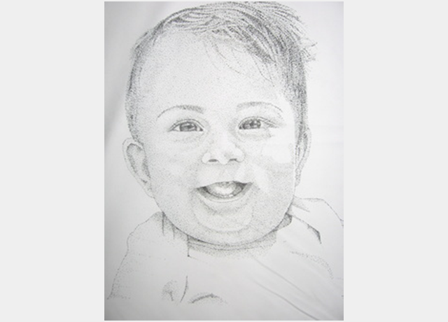 A drawing of a baby with a smile on its face.