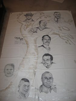 A drawing of people with their faces drawn